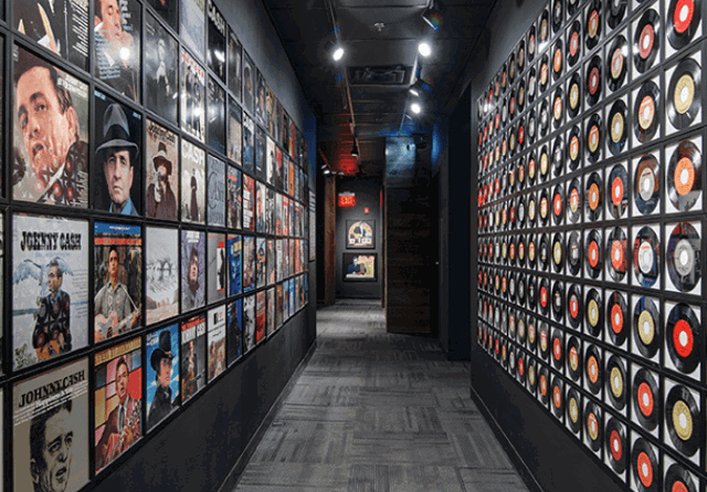 A graphic of Johnny Cash vinyls, capturing the legacy of the legendary country music artist.