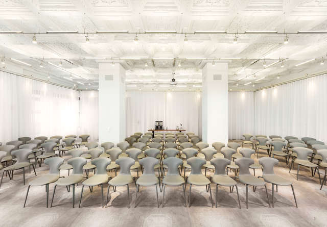 Manor Theater at Virgin Hotels Chicago, featuring plush seating, a large screen, and an intimate setting ideal for private screenings and events.