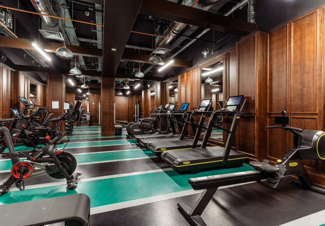 Fully equipped fitness centre with modern machines and a bright atmosphere at Virgin Hotels London-Shoreditch.
